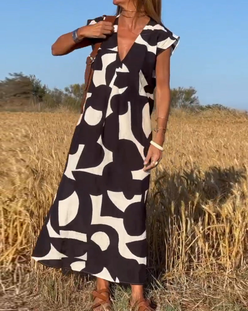 Elowen - Ärmelloses Kleid mit asymmetrischem geometrischem Design