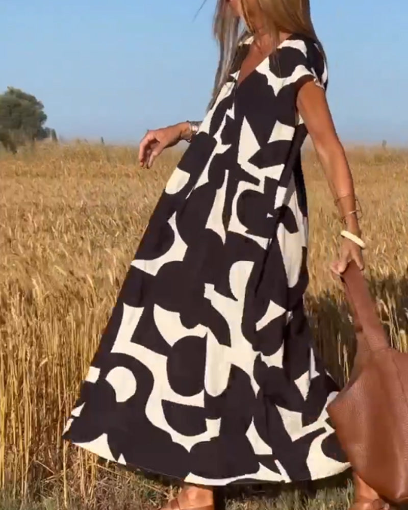Elowen - Ärmelloses Kleid mit asymmetrischem geometrischem Design