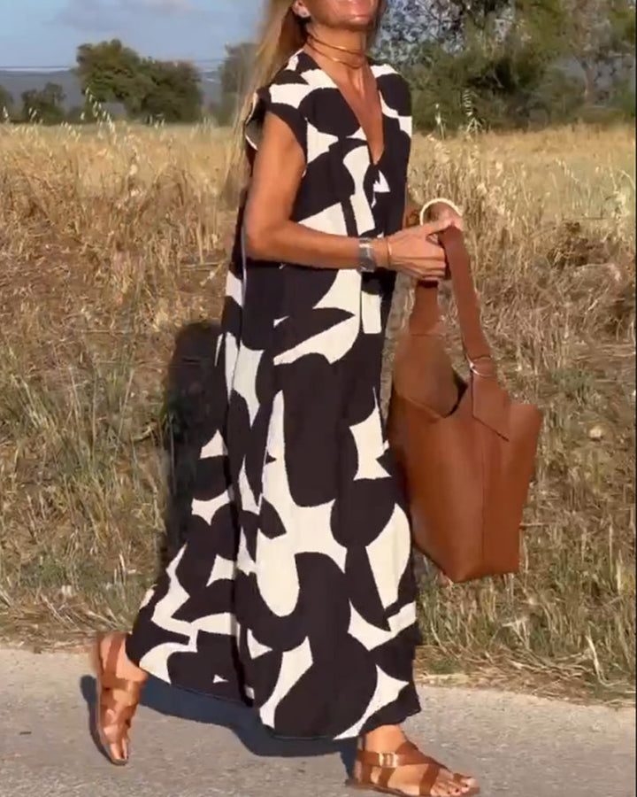 Elowen - Ärmelloses Kleid mit asymmetrischem geometrischem Design