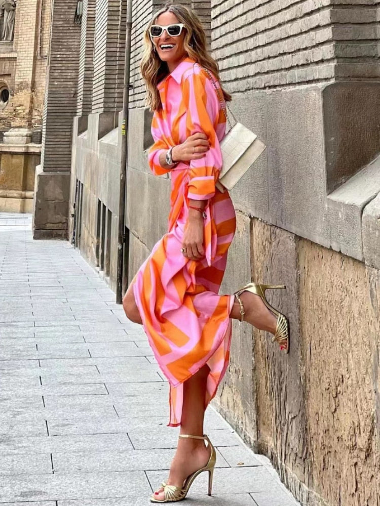 Clarissa | Gestreiftes Midi Hemdblusenkleid" can be rewritten as:

"Clarissa | Streifen-Midi Hemdblusenkleid