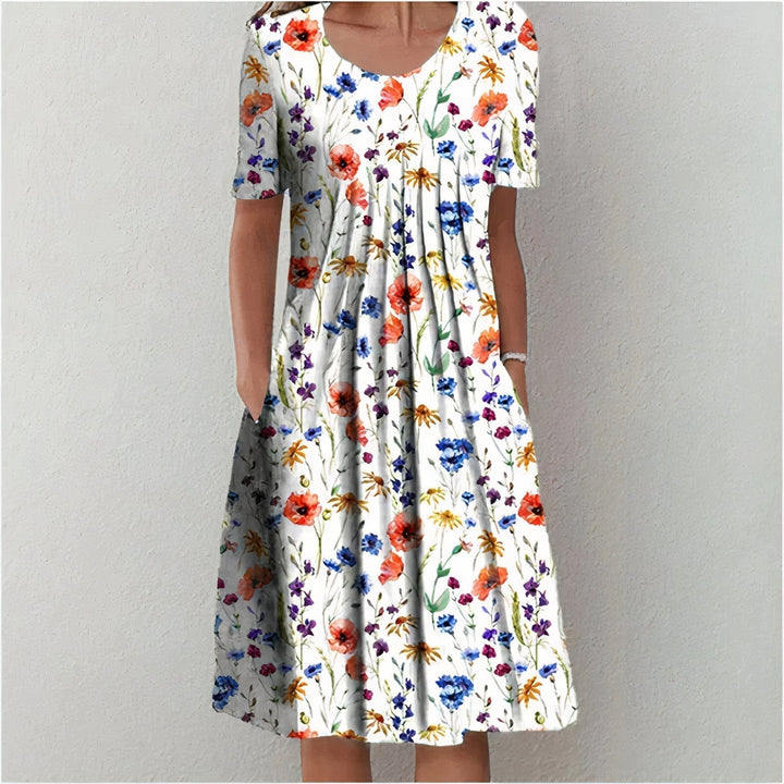 Leilani - Rüschendes Abendkleid im Sommerblüten-Design