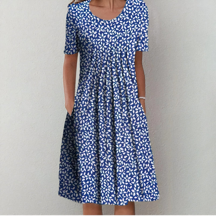 Leilani - Rüschendes Abendkleid im Sommerblüten-Design