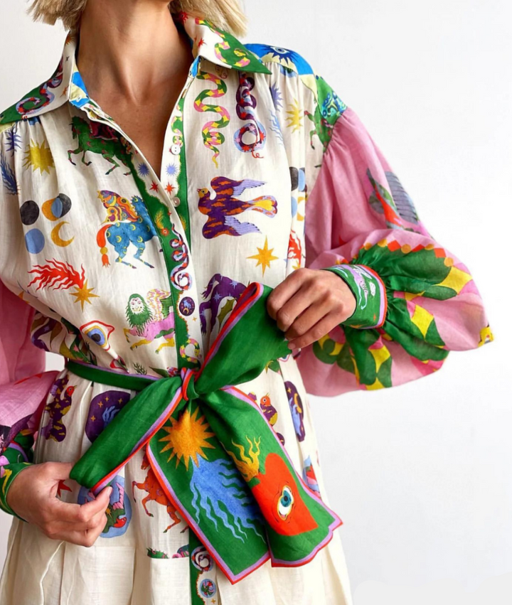 Capri - Stilvolles Kleid mit Laternenärmeln und Taillengürtel