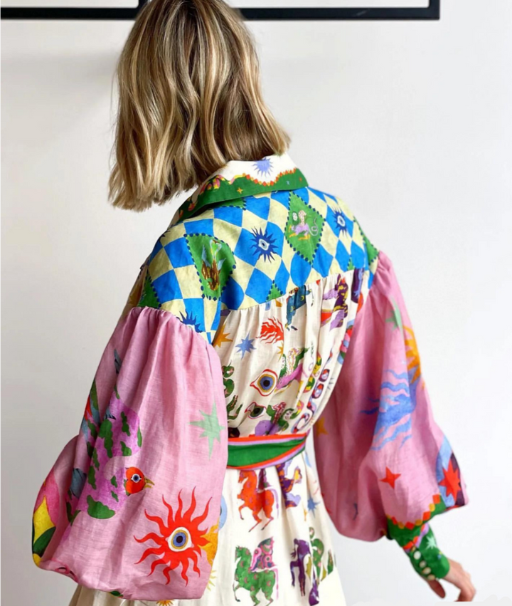 Capri - Stilvolles Kleid mit Laternenärmeln und Taillengürtel