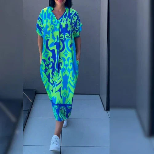 Gabriella – Figurschmeichelndes Blumenkleid