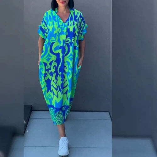 Gabriella – Figurschmeichelndes Blumenkleid