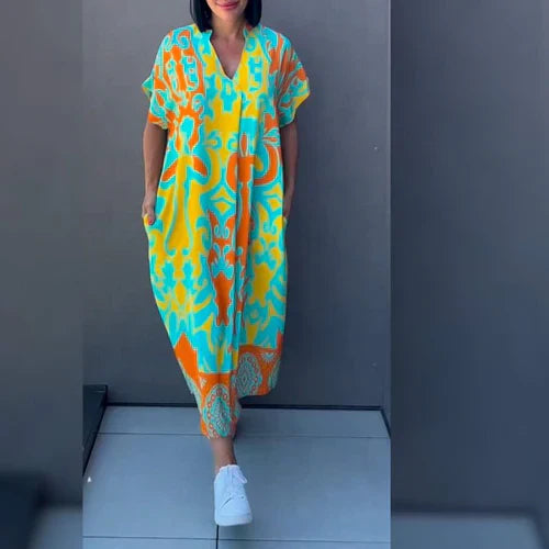 Gabriella – Figurschmeichelndes Blumenkleid
